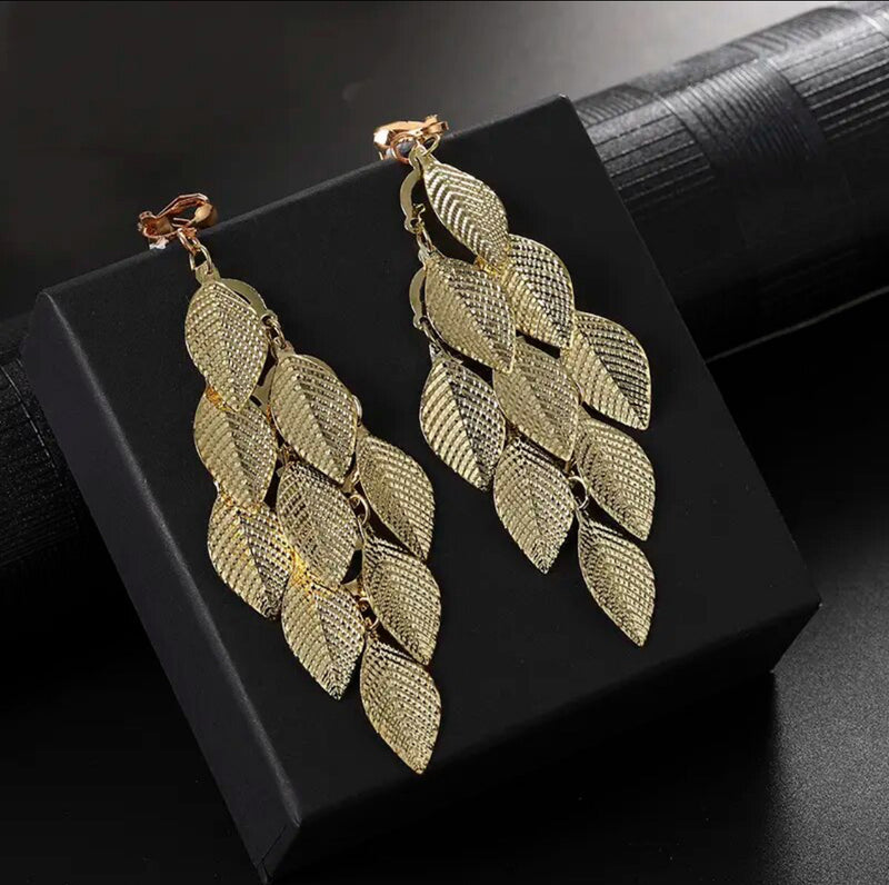 Clip on gold 4" long textured indented line layered leaf earrings