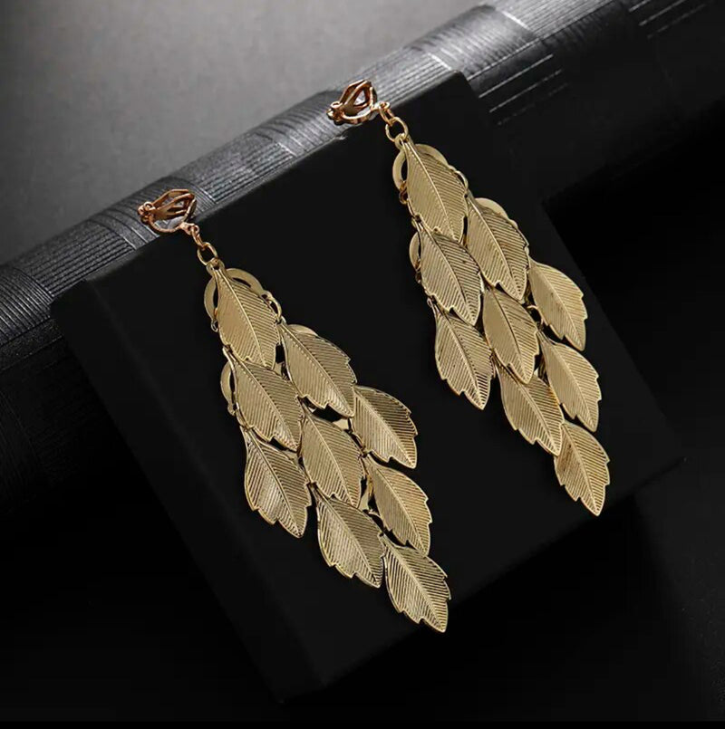 Clip on gold 4" long textured indented line pointed leaf earrings