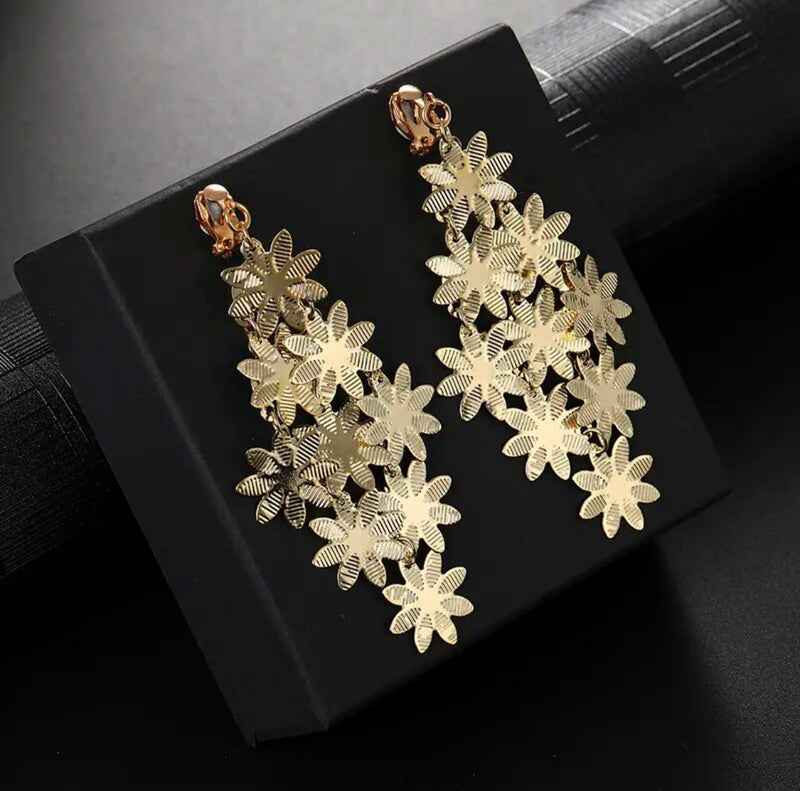 Clip on 3 3/4" gold layered dangle flower earrings