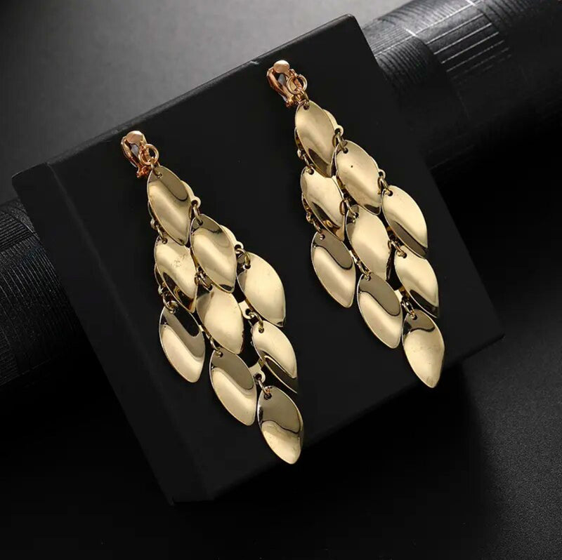 Clip on 3 3/4" shiny gold layered bent leaf earrings