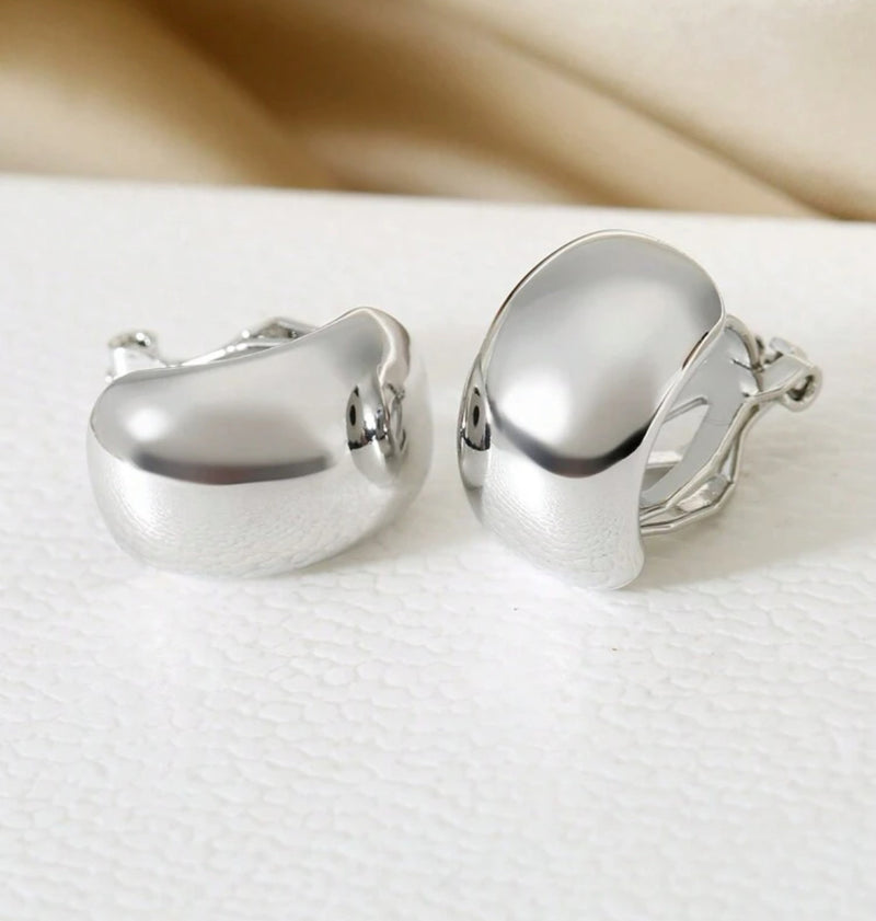 Clip on 3/4" shiny silver scoop style earrings
