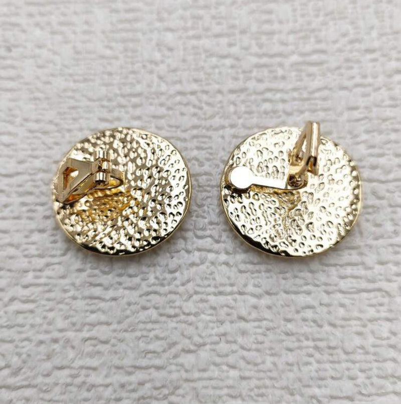 Clip on 1" gold and white center round button style earrings