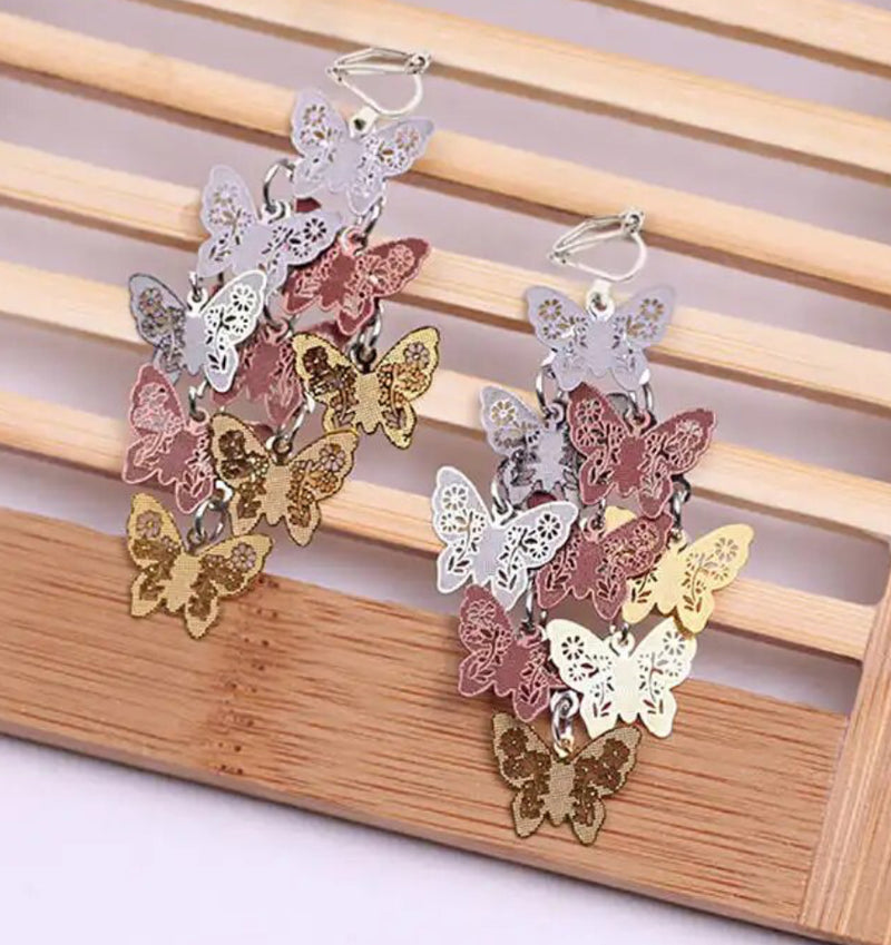 Clip on 2 1/4" silver and brown multi-colored textured butterfly earrings