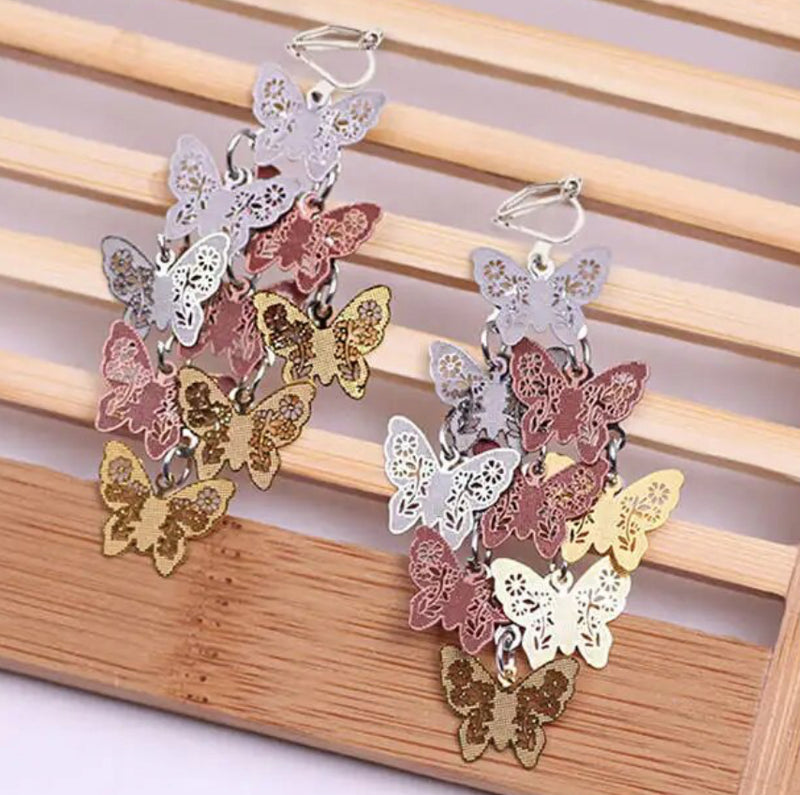 Clip on 2 1/4" silver and brown multi-colored textured butterfly earrings