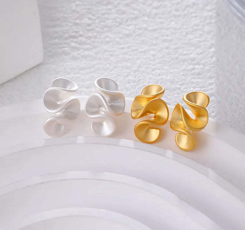 Clip on 1/2" Xsmall comfort fit matte gold wavy earrings