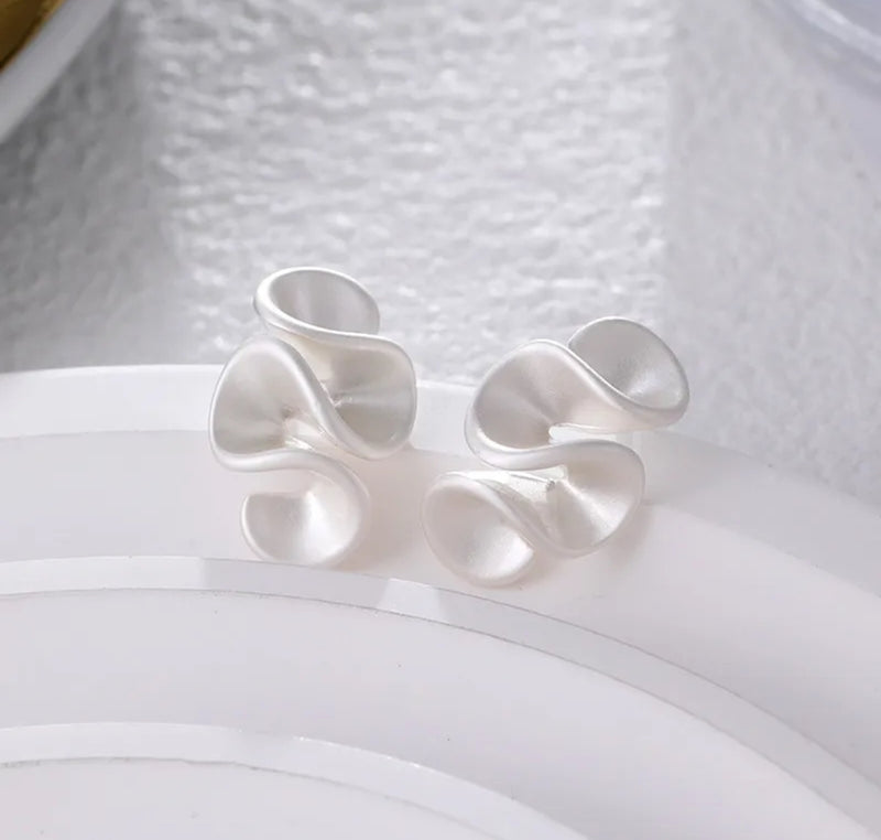 Clip on 1/2" Xsmall comfort fit matte silver wavy earrings