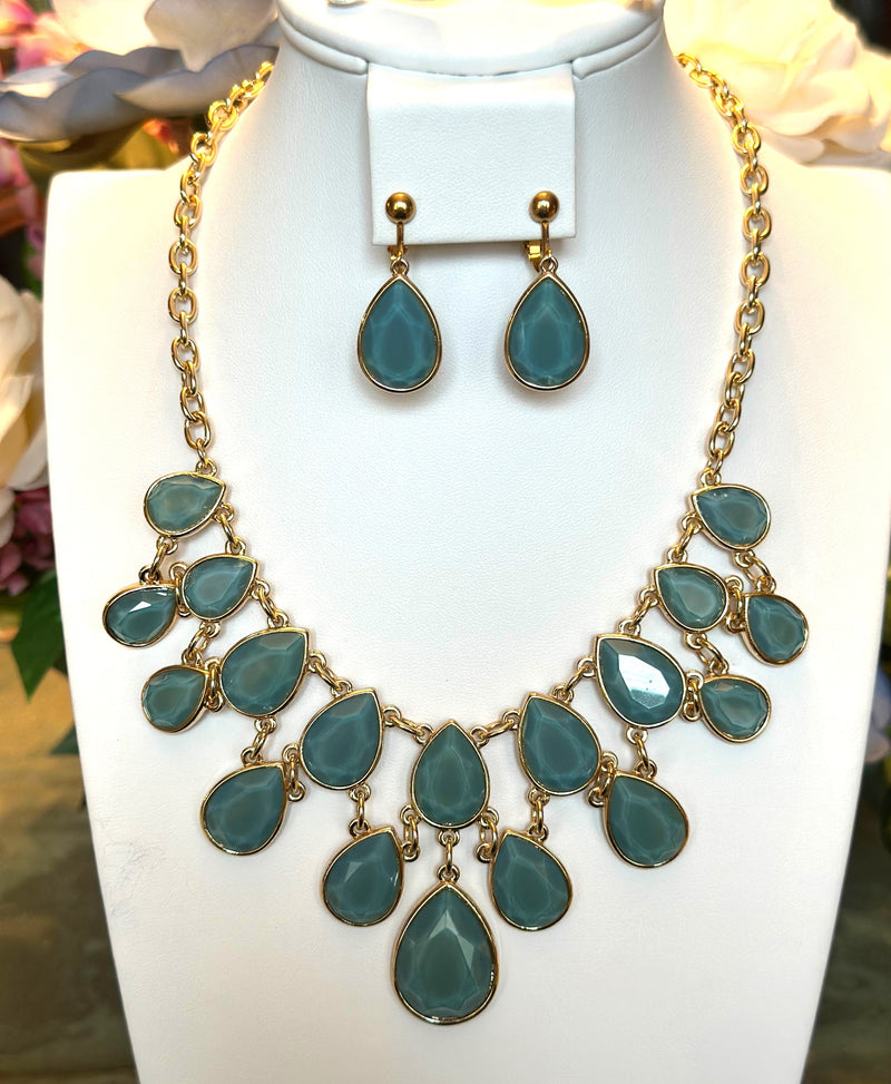 Clip on gold chain and blue teardrop stone statement necklace and earring set