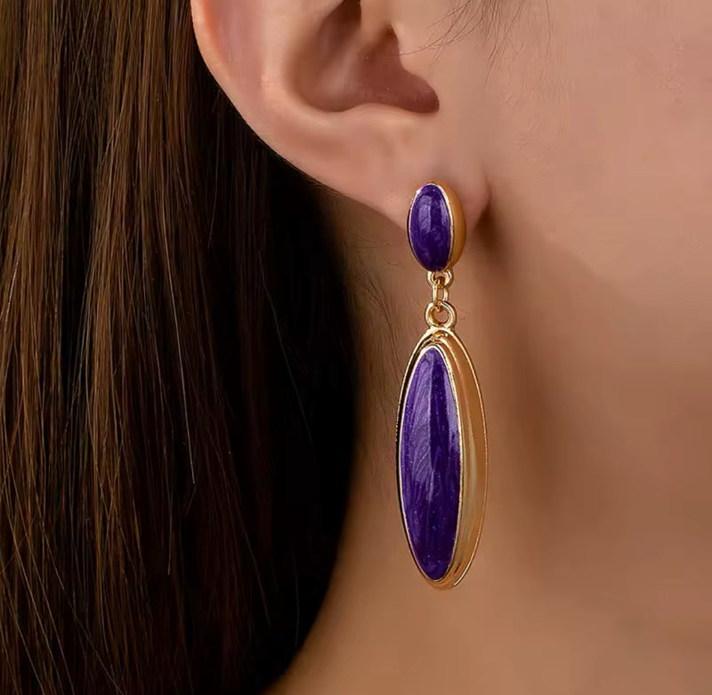 Pierced 2 1/2" gold and purple long scoop style dangle earrings