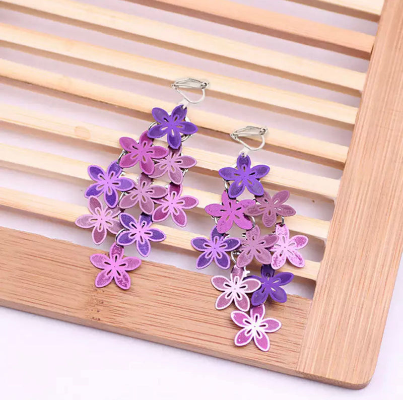 Clip on 2 3/4" silver and purple layered flower dangle earrings