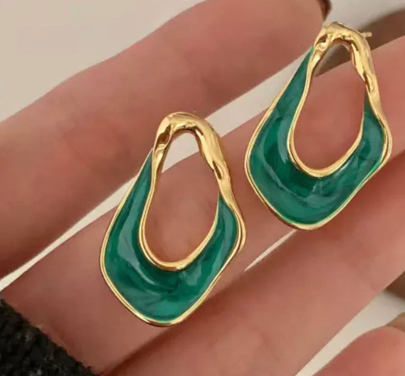 Clip on 1" gold and green odd shaped bent earrings