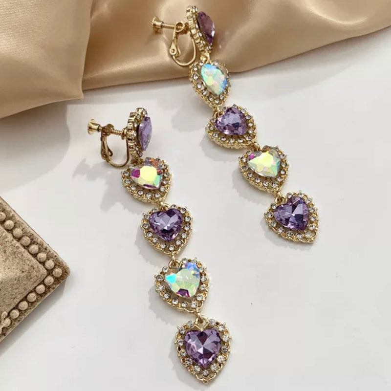 Vintage 3 3/4" clip on purple fluorescent stone dangle heart earrings
