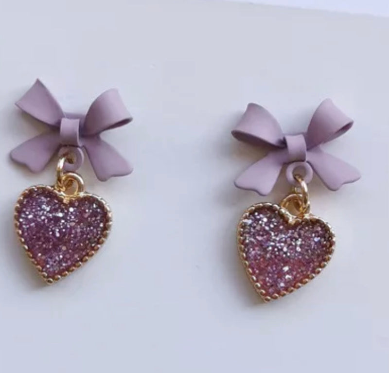 Clip on 1" gold, purple bow earrings w/glitter heart