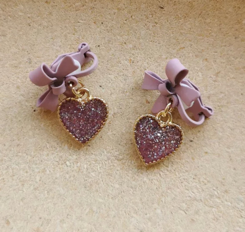 Clip on 1" gold, purple bow earrings w/glitter heart