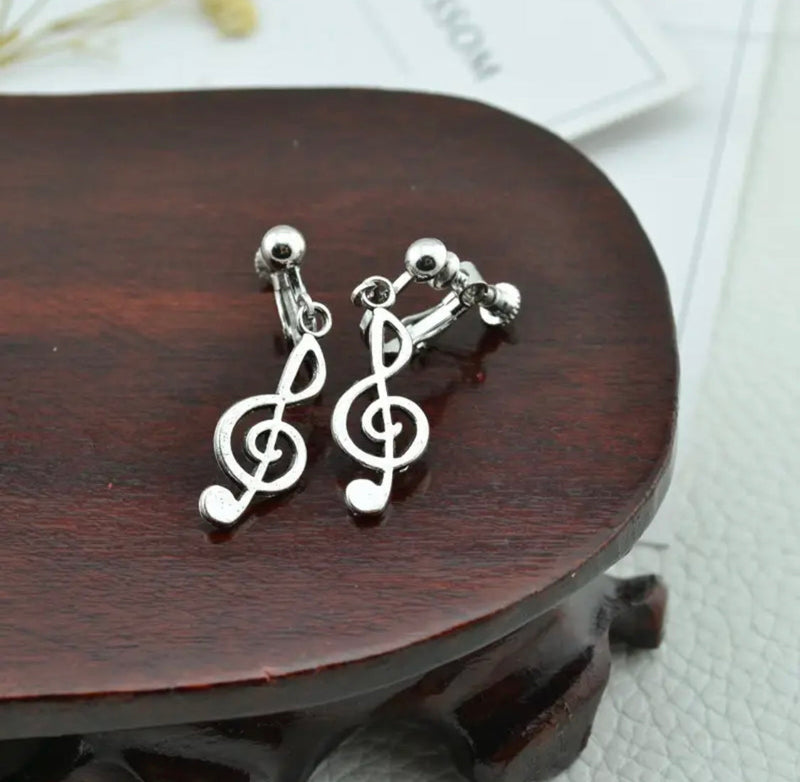 Clip on 1 1/2" silver dangle music note with screw back clasp