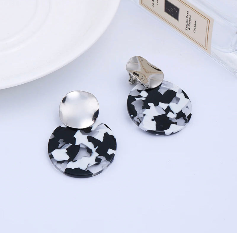 Clip on 1 3/4" silver, black, and white double bent circle earrings