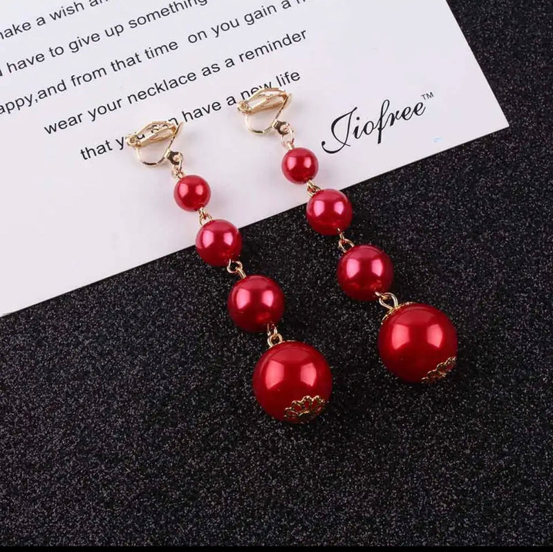 Clip on 3" gold and red pearl graduated dangle bead earrings