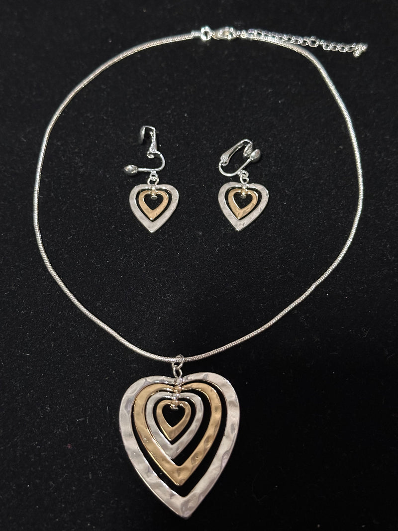 Clip on silver and gold heart pendant necklace and earring set
