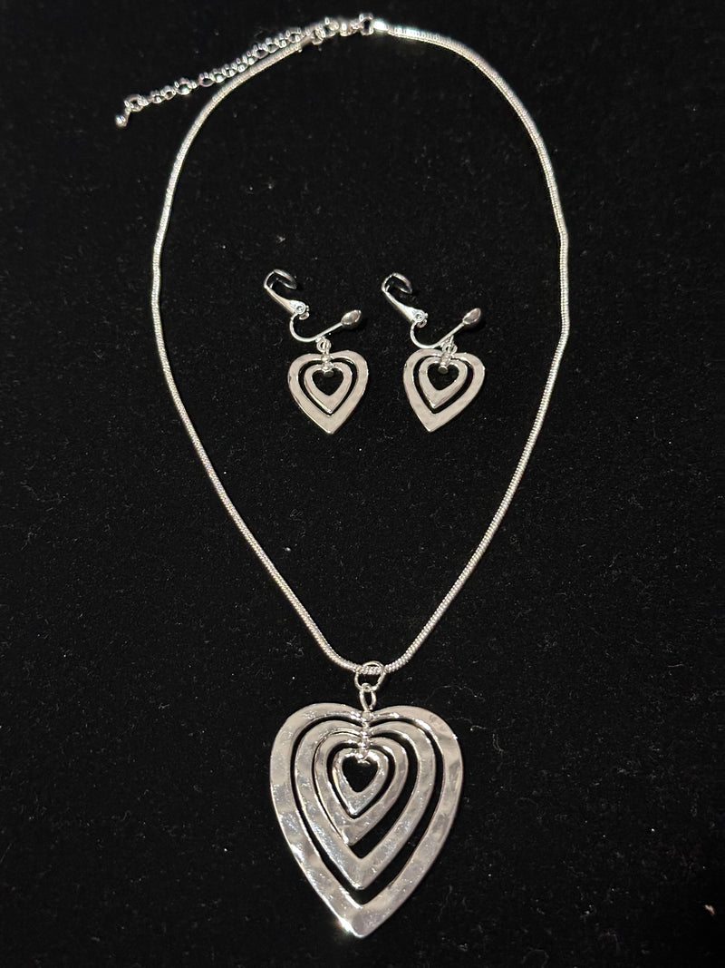 Clip on silver layered heart pendant necklace and earring set