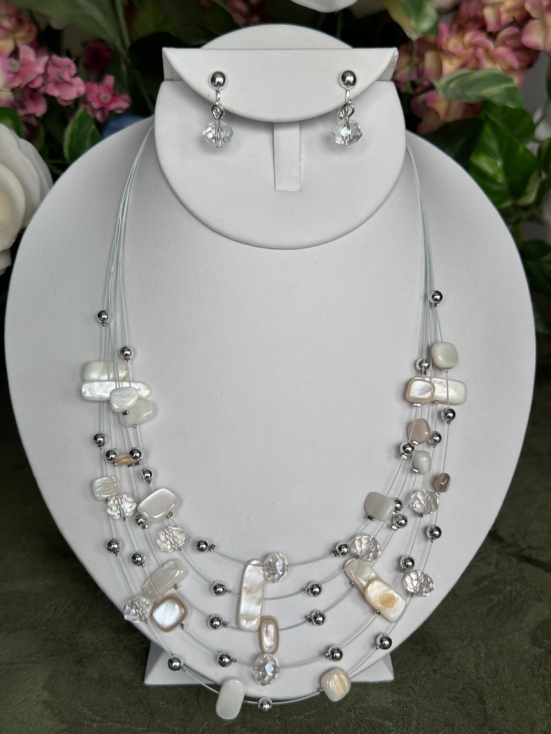 Clip on silver and white odd shaped bead wire necklace and earring set