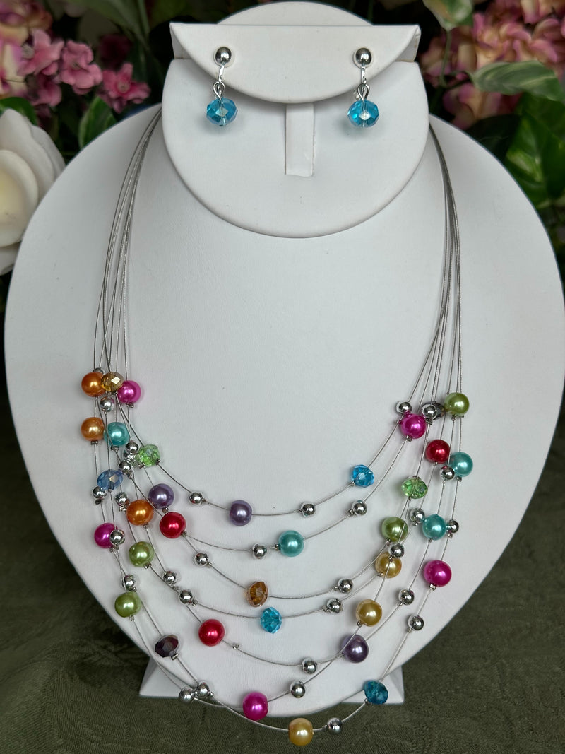 Clip on silver and multi colored pearl multi strand necklace and earring set