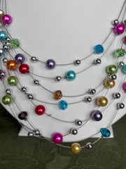 Clip on silver and multi colored pearl multi strand necklace and earring set