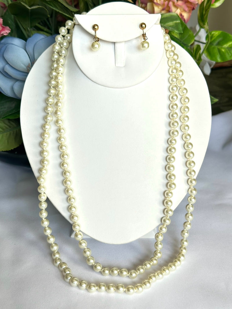 Clip on 54" long gold and white pearl necklace and earring set