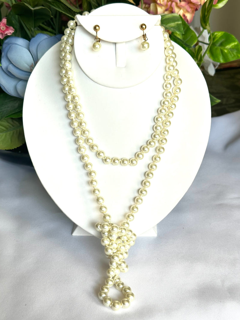 Clip on 54" long gold and white pearl necklace and earring set