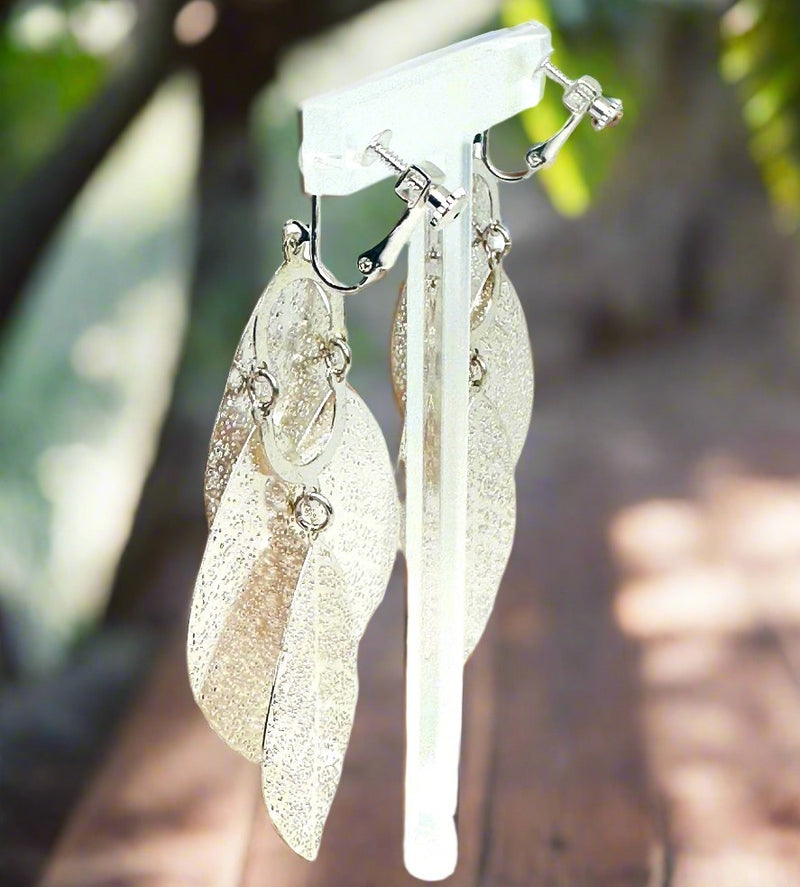 Clip on 3 1/2" long silver pinhole layered leaf earrings