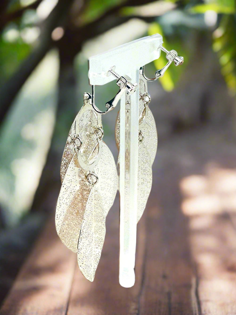 Clip on 3 1/2" long silver pinhole layered leaf earrings