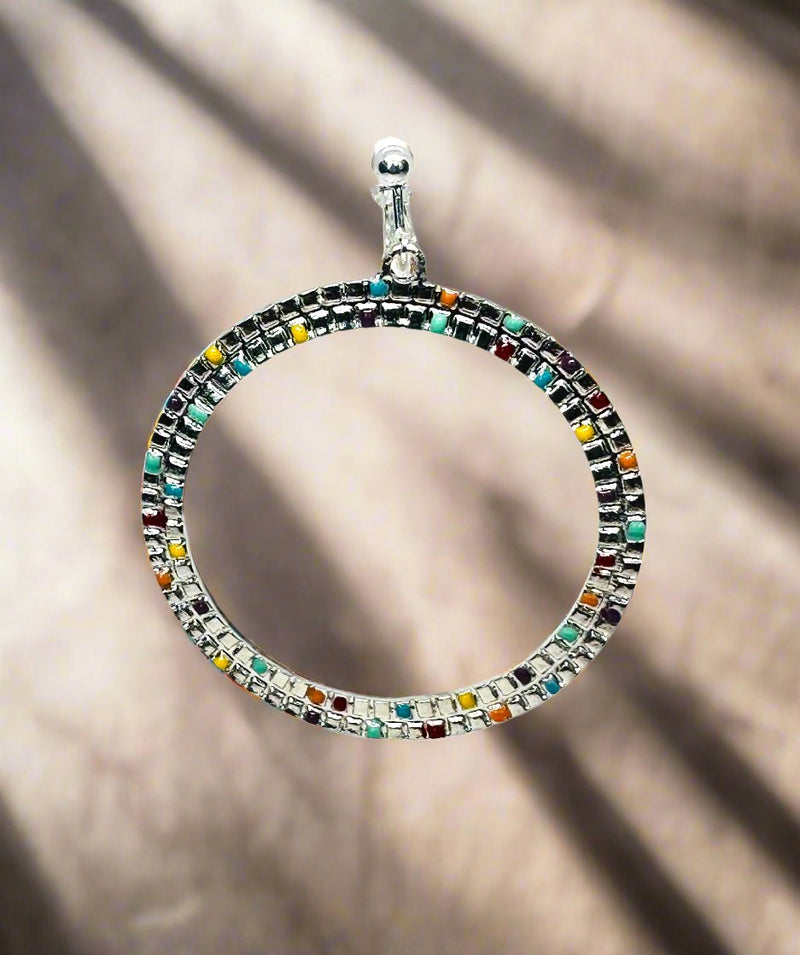 Clip on 2 3/4" silver and multi colored dot dangle hoop earrings