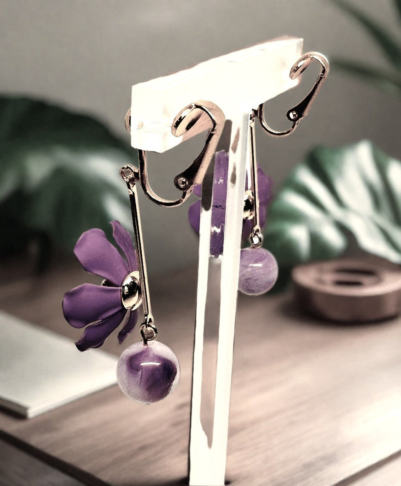 Clip on 2" gold wire and purple flower earrings with a dangle purple bead