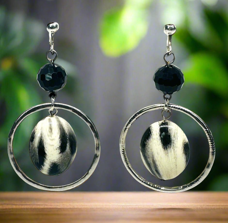 Clip on 2 3/4" silver hoop earrings with center black and white bead