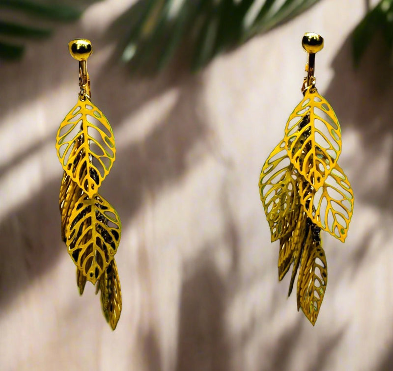 Clip on 2 3/4" gold cutout layered leaf dangle earrings