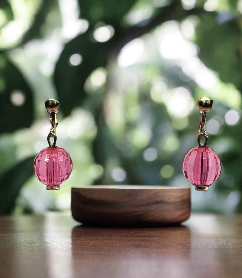 Clip on 1 1/4" gold and pink dangle bead earrings