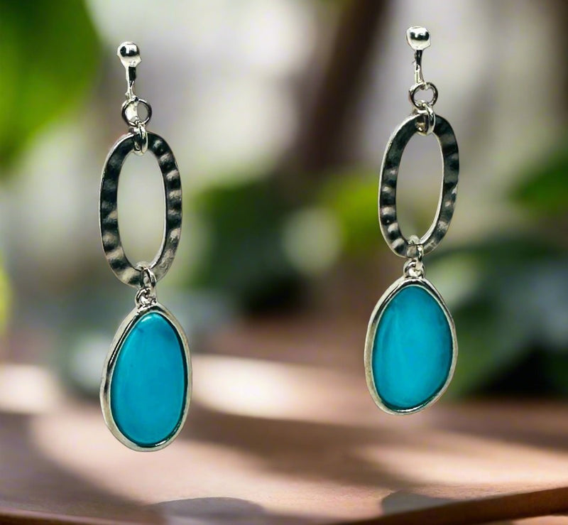 Clip on 2 3/4" silver earrings with dangle flat turquoise stone