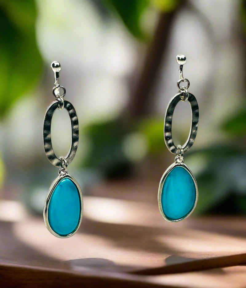 Clip on 2 3/4" silver earrings with dangle flat turquoise stone