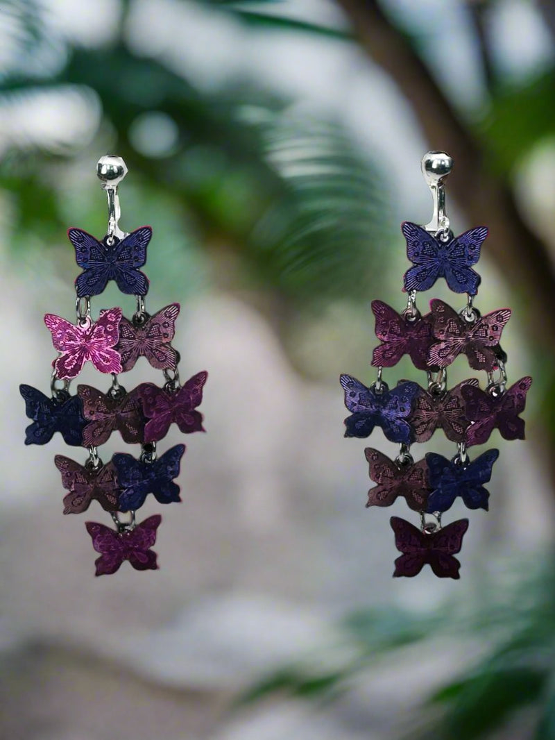 Clip on 2 1/2" silver and purple butterfly layered dangle earrings