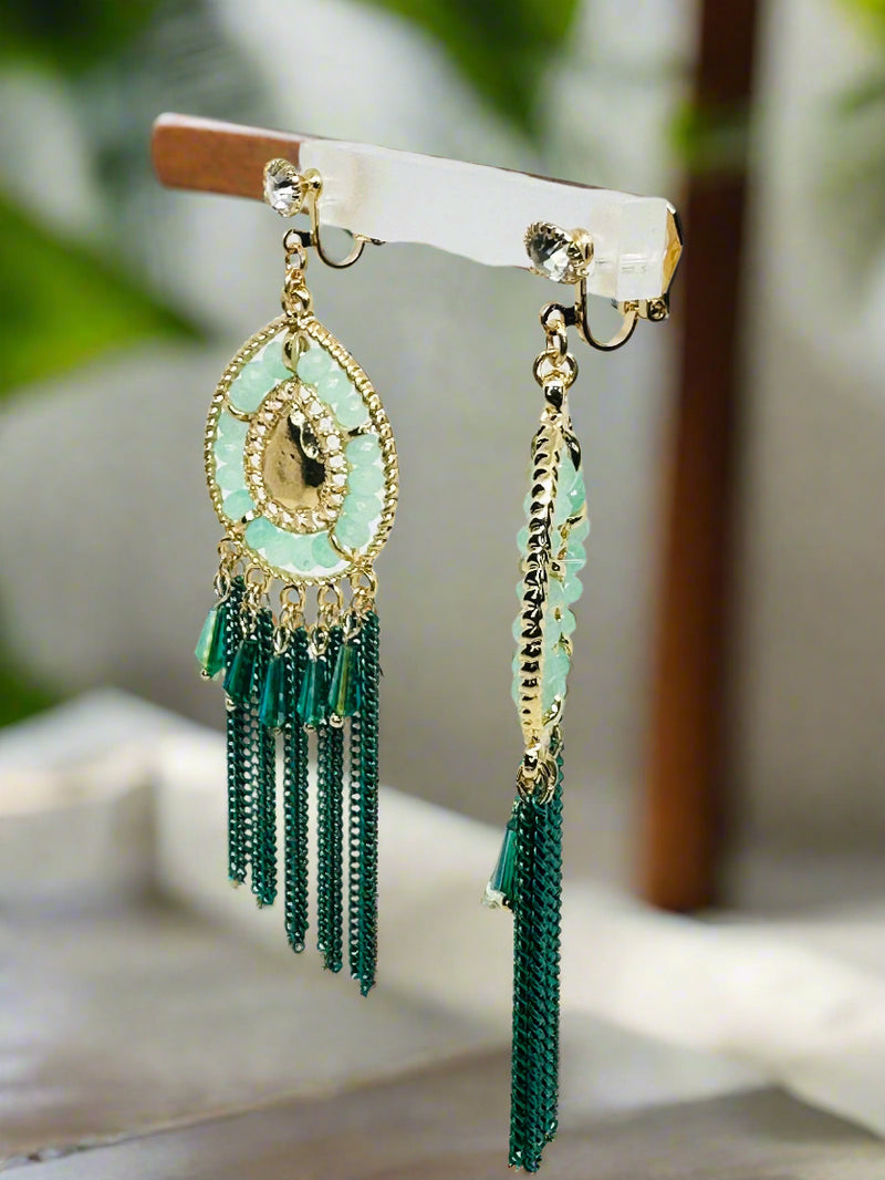 Clip on 4" gold and seafoam multi chain dangle earrings with clear stone