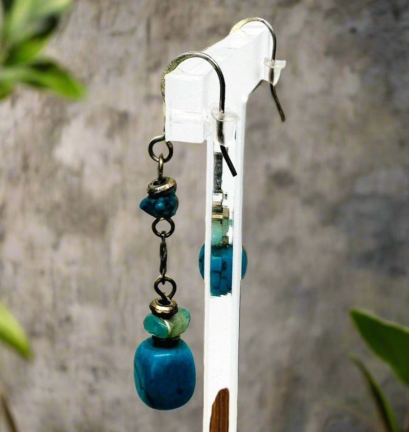 Pierced 2 1/4" silver and turquoise odd shaped bead earrings