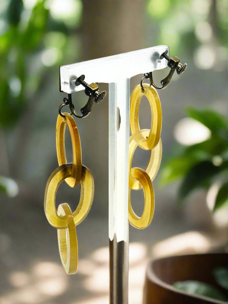 Clip on 3 1/2" brass and brown plastic link dangle earrings