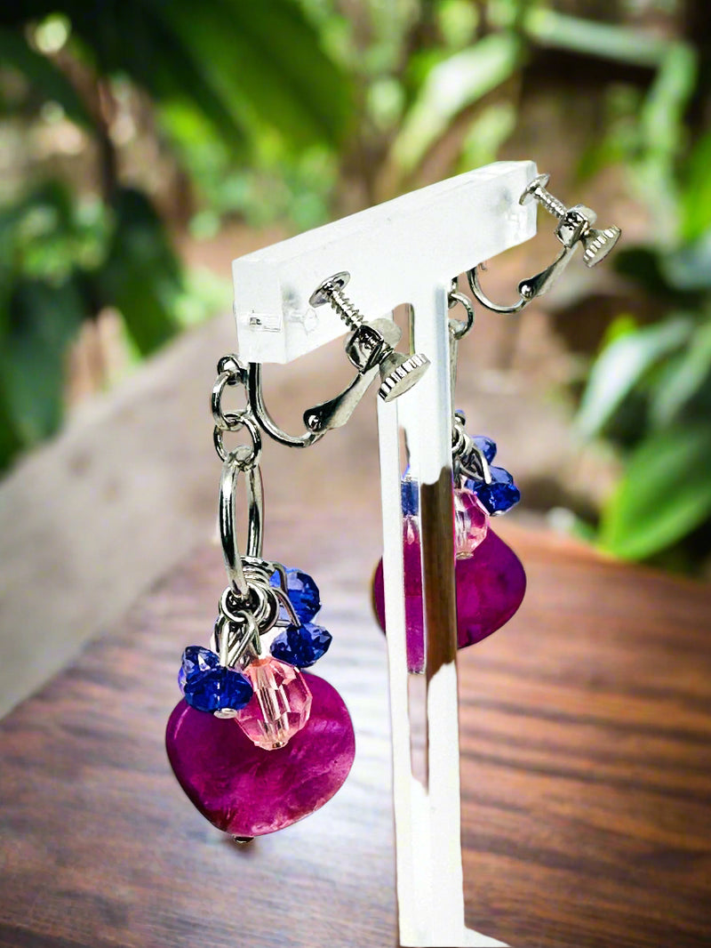 Clip on 2 1/4" silver, purple and pink odd shaped dangle bead earrings