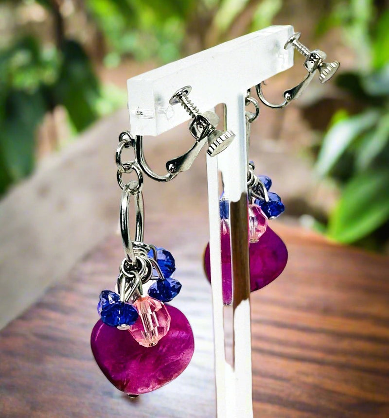 Clip on 2 1/4" silver, purple and pink odd shaped dangle bead earrings