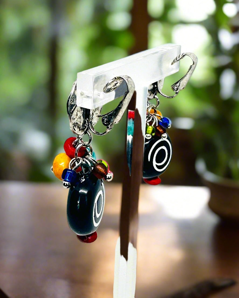 Clip on 2" silver, black, red and white multi colored dangle earrings