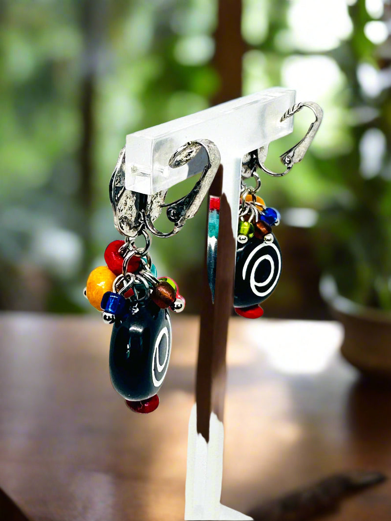 Clip on 2" silver, black, red and white multi colored dangle earrings