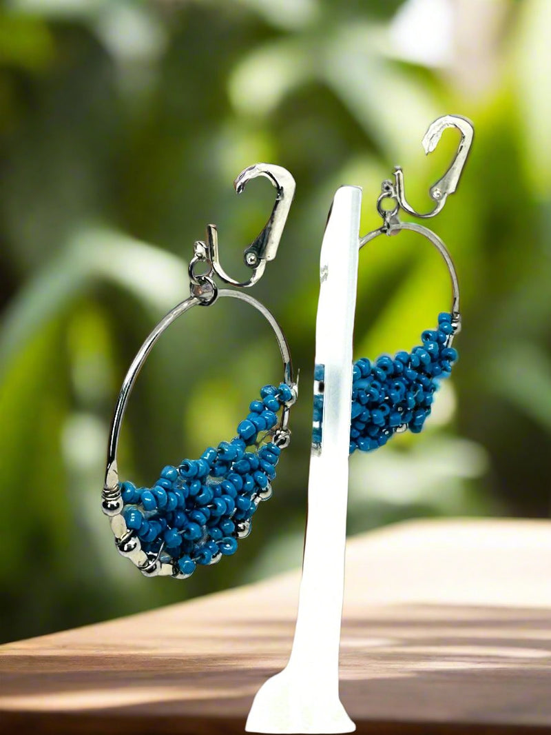 Clip on 2 1/4" silver and blue seed bead dangle circle earrings