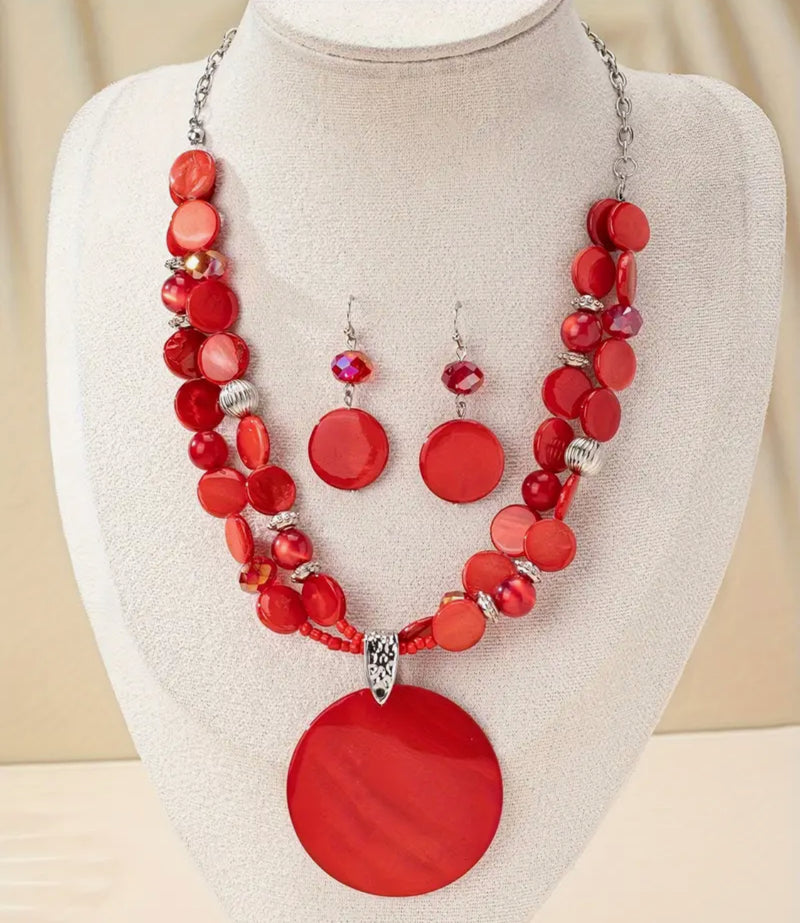 Pierced silver and red shell bead necklace and earring set