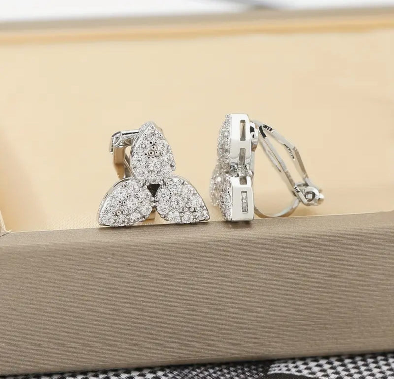 Clip on 1/2" small silver and small clear stone pointed button style earrings