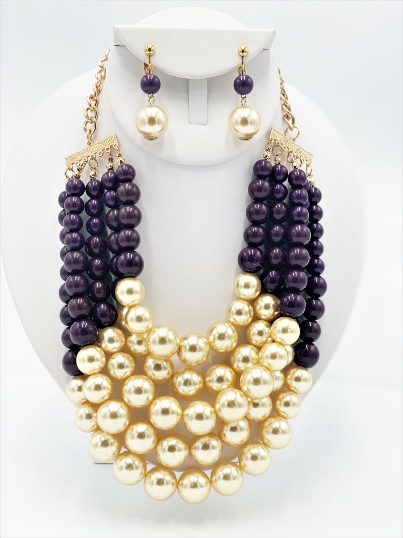 Clip on multi strand gold, purple, and cream pearl necklace set