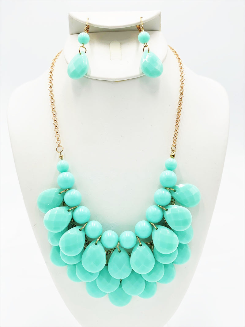 Clip on gold and turquoise teardrop bead necklace and earring set