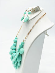 Clip on gold and turquoise teardrop bead necklace and earring set